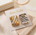 Aretes Chunky Ondulados con Relieve Bicolor